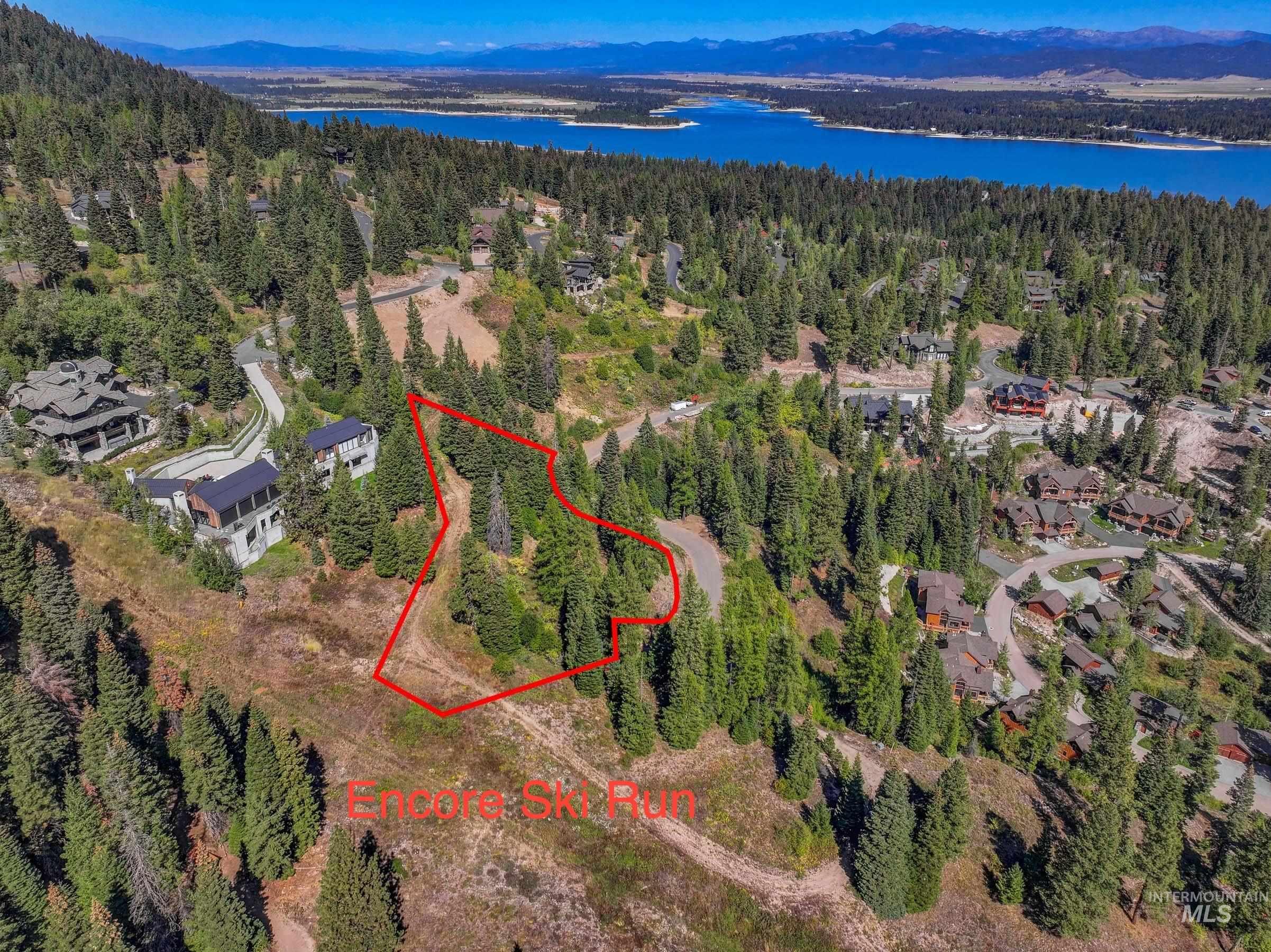 Aerial overview of property's location featuring property parcel outlined and Cascade Lake