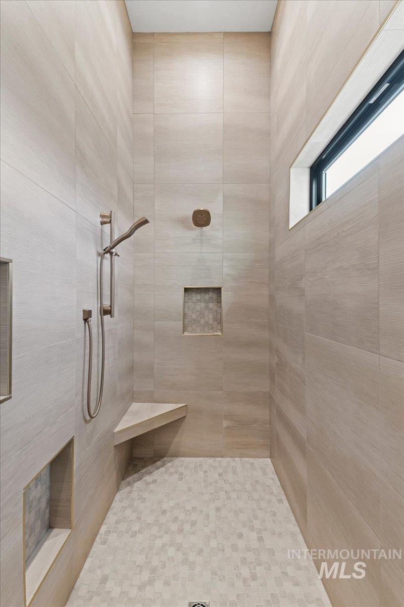 Bathroom with tiled shower