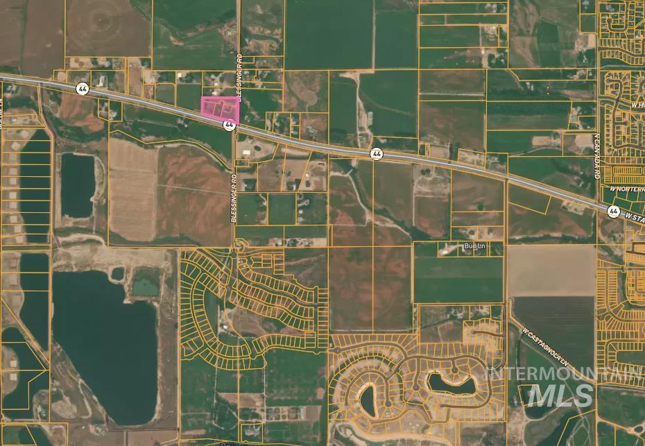 Aerial map of property and surrounding area with property boundaries highlighted