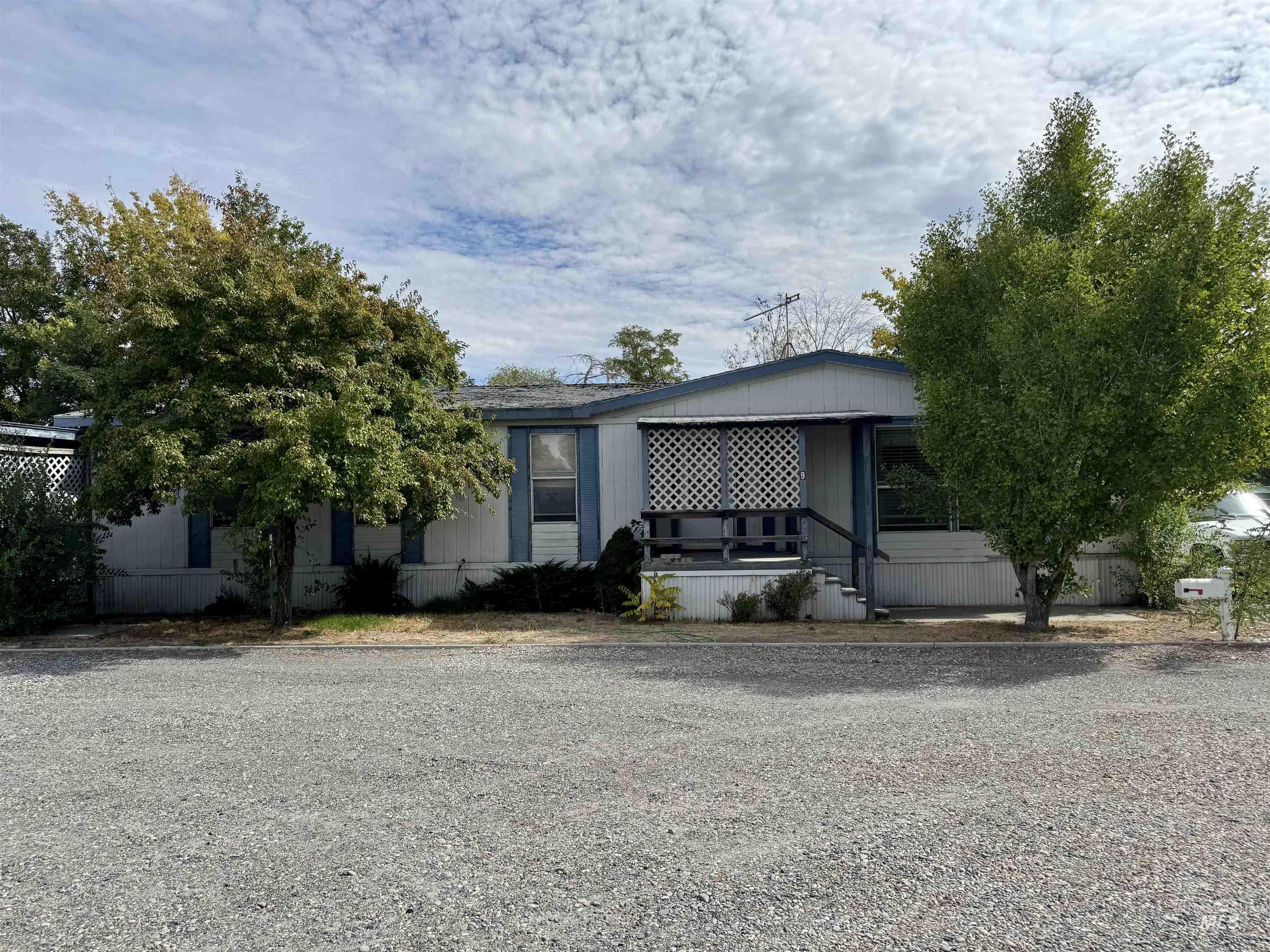 View of front of house with covered porch