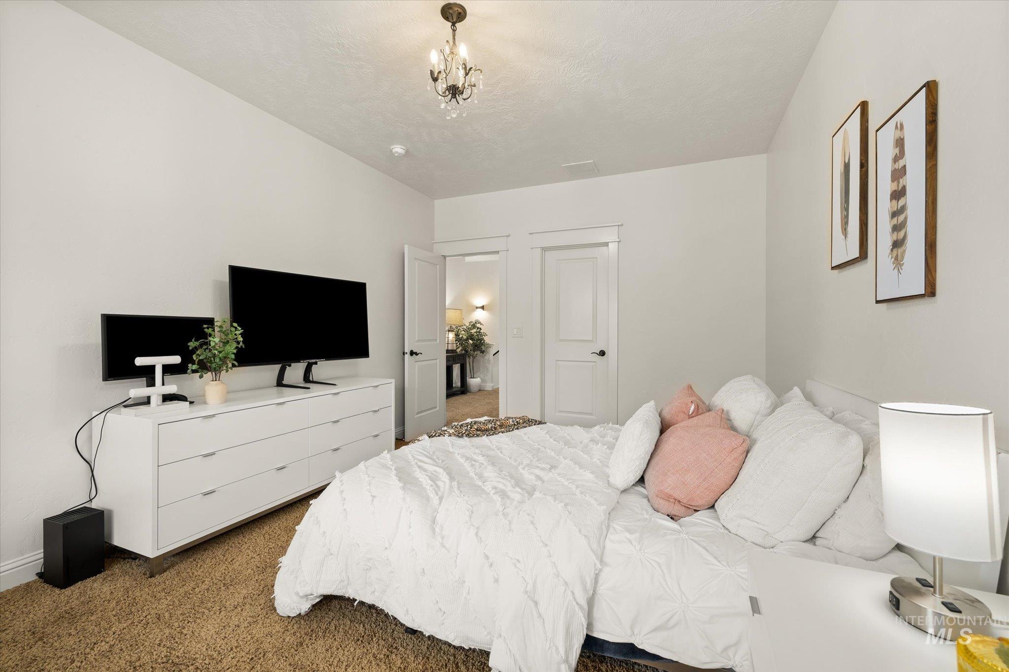 Bedroom with carpet