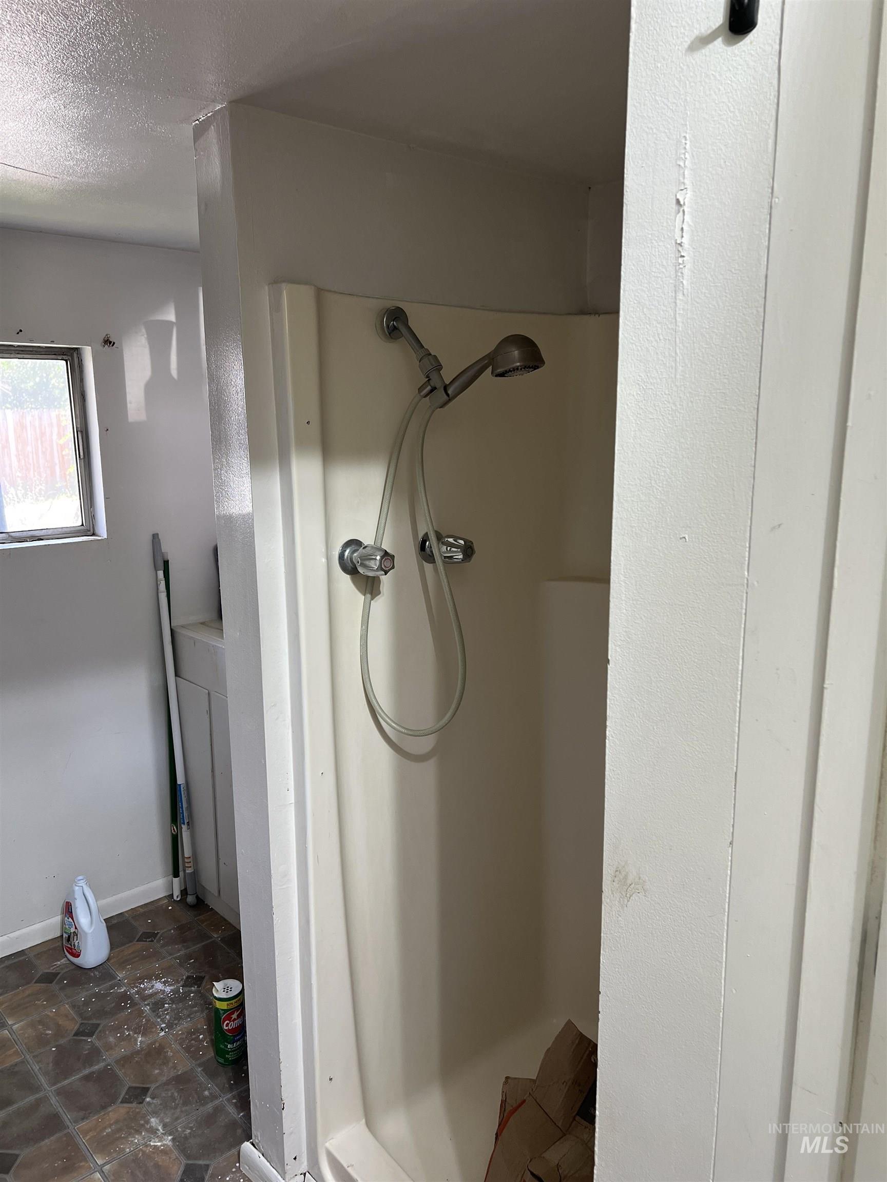 Full bathroom featuring a shower