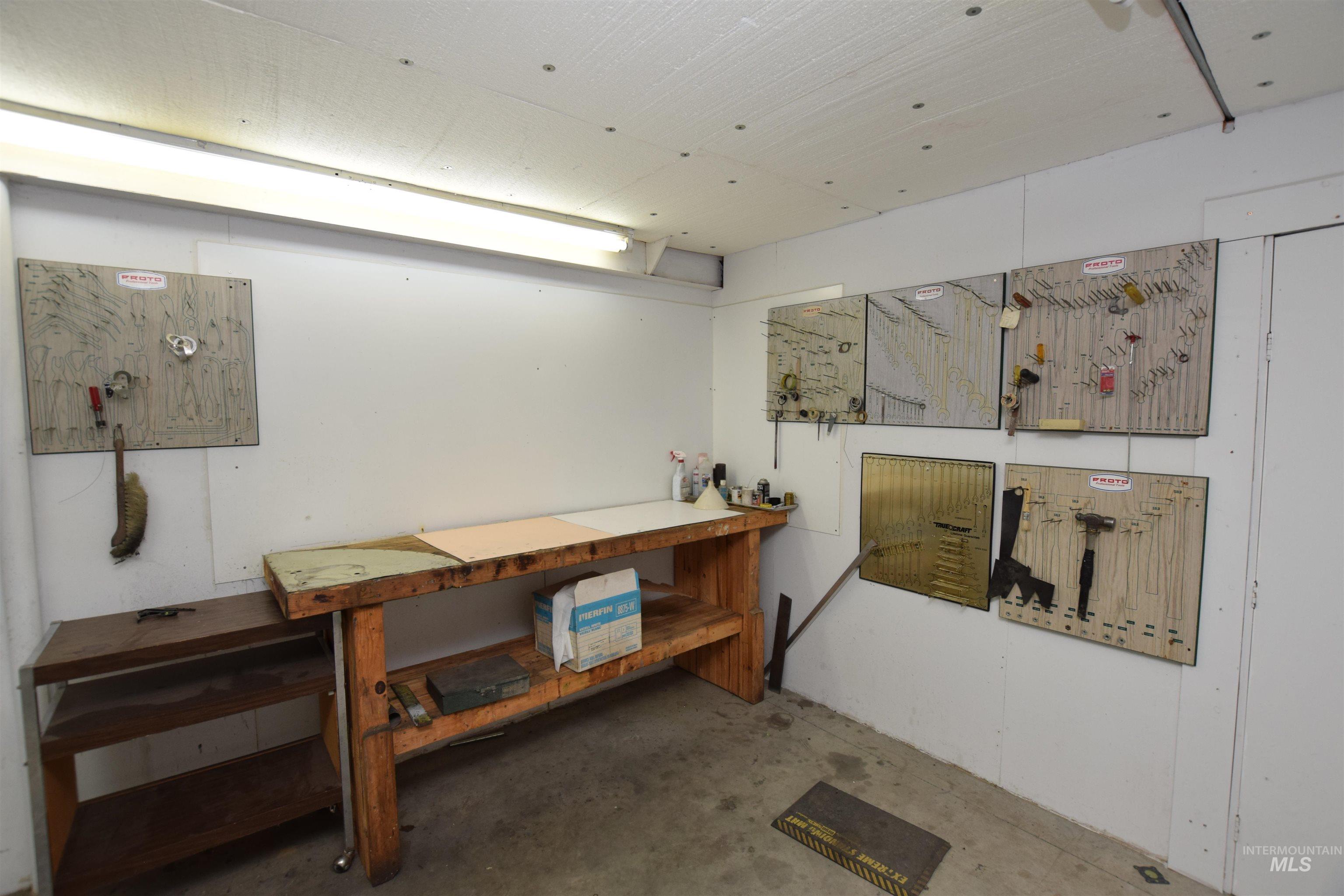 Basement featuring a workshop area
