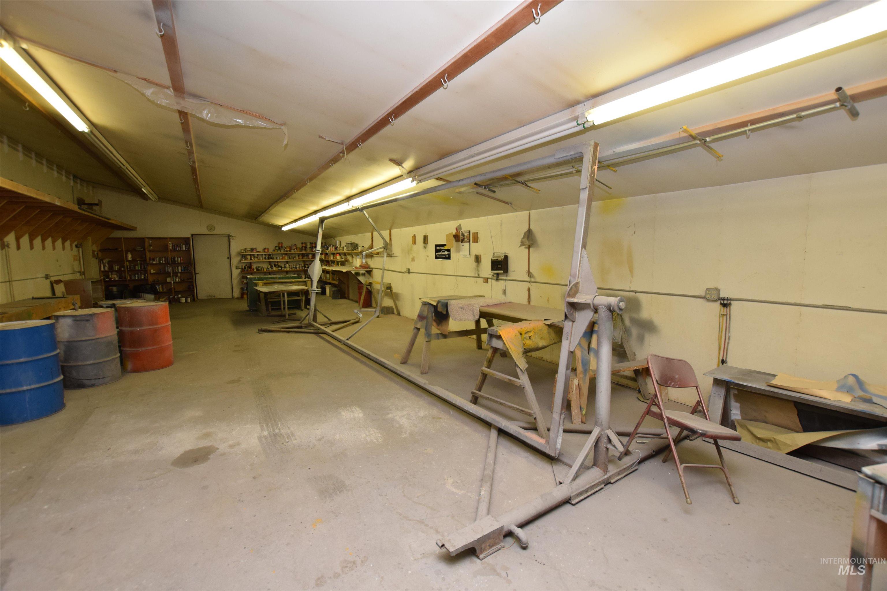 Below grade area featuring a workshop area and a garage