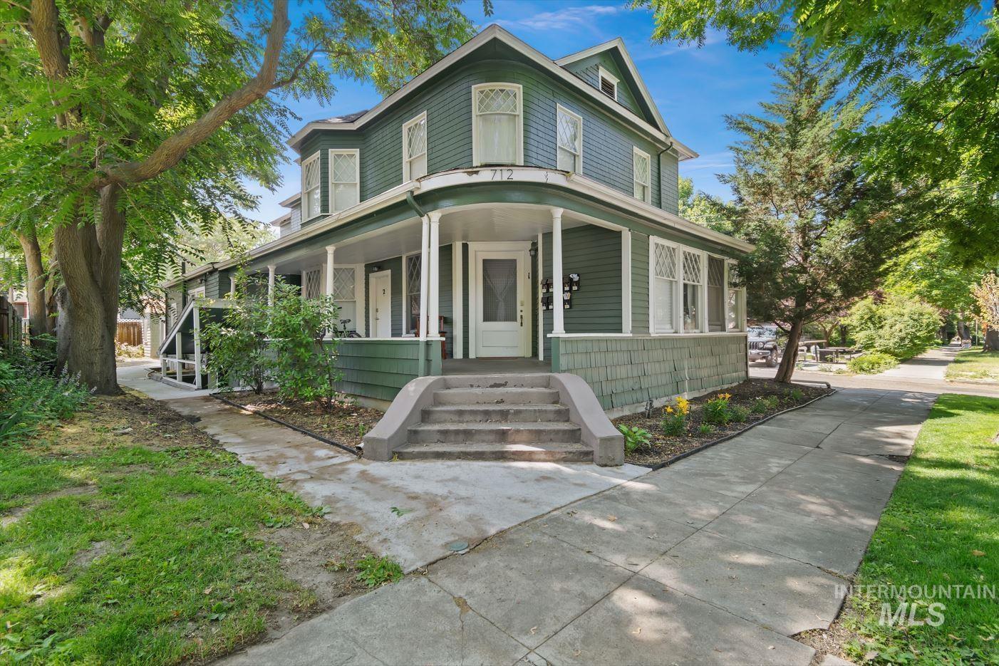 Victorian home featuring a porch