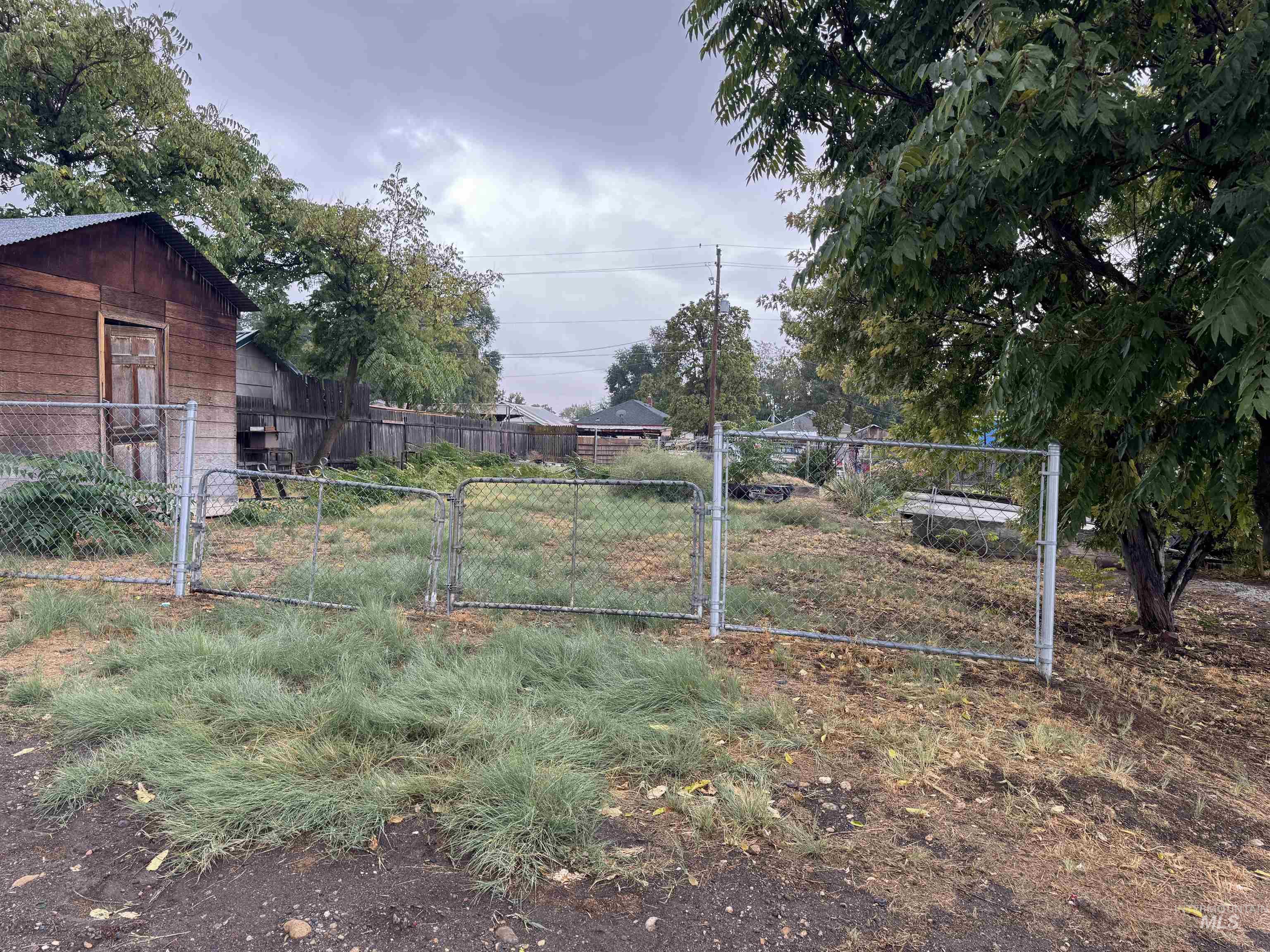 View of yard with a gate