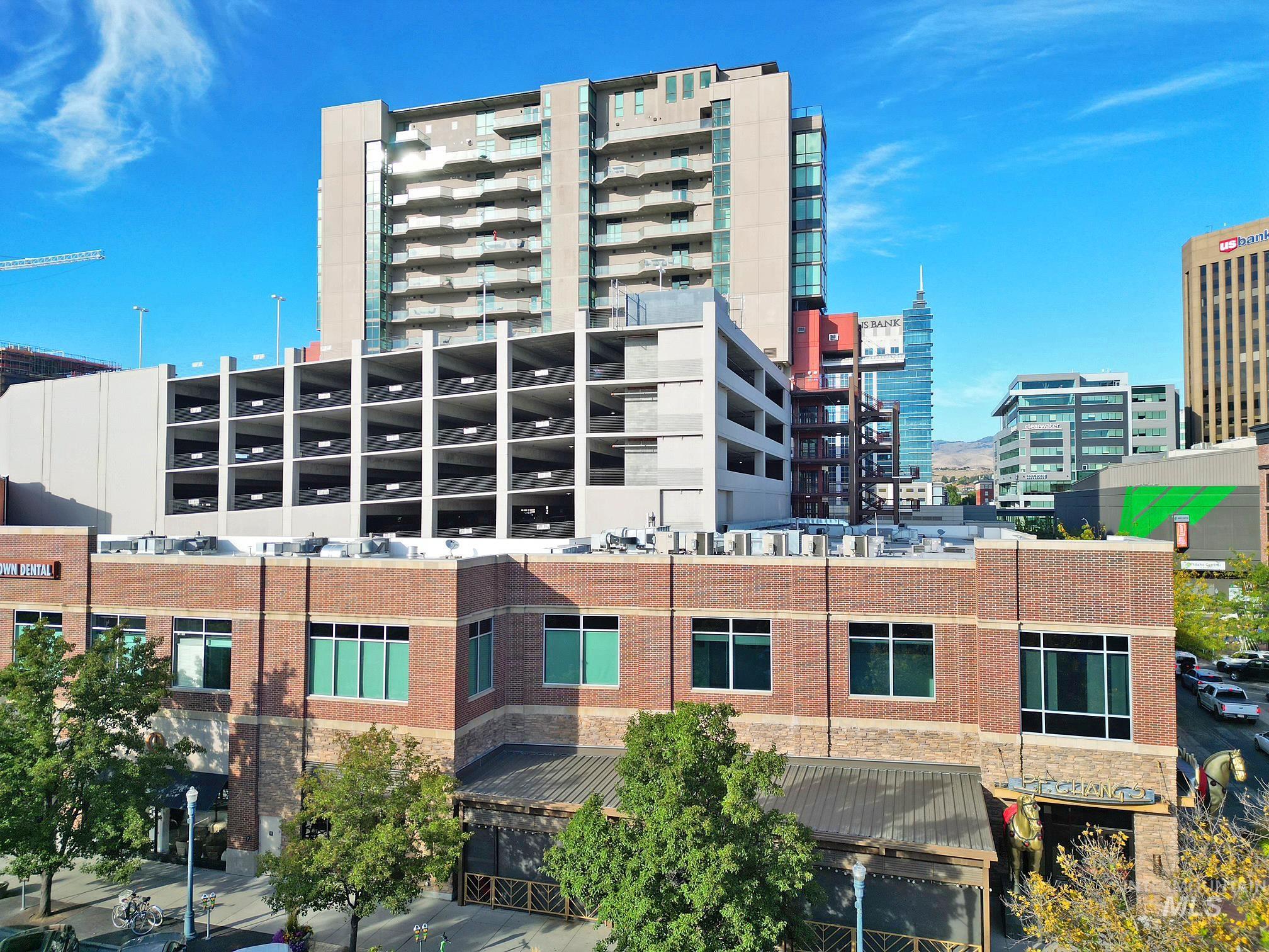 View of building exterior featuring a city view