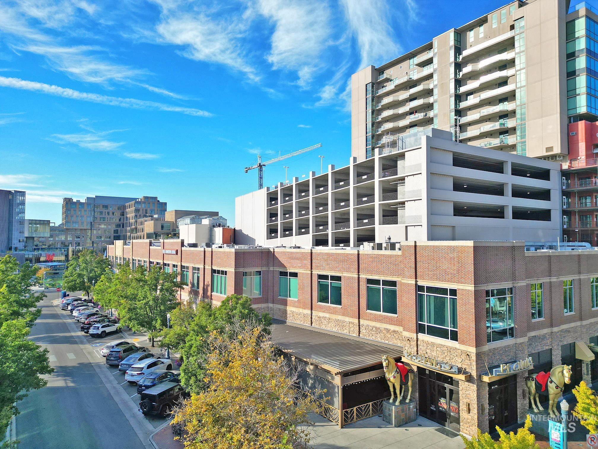 View of building exterior featuring a city view