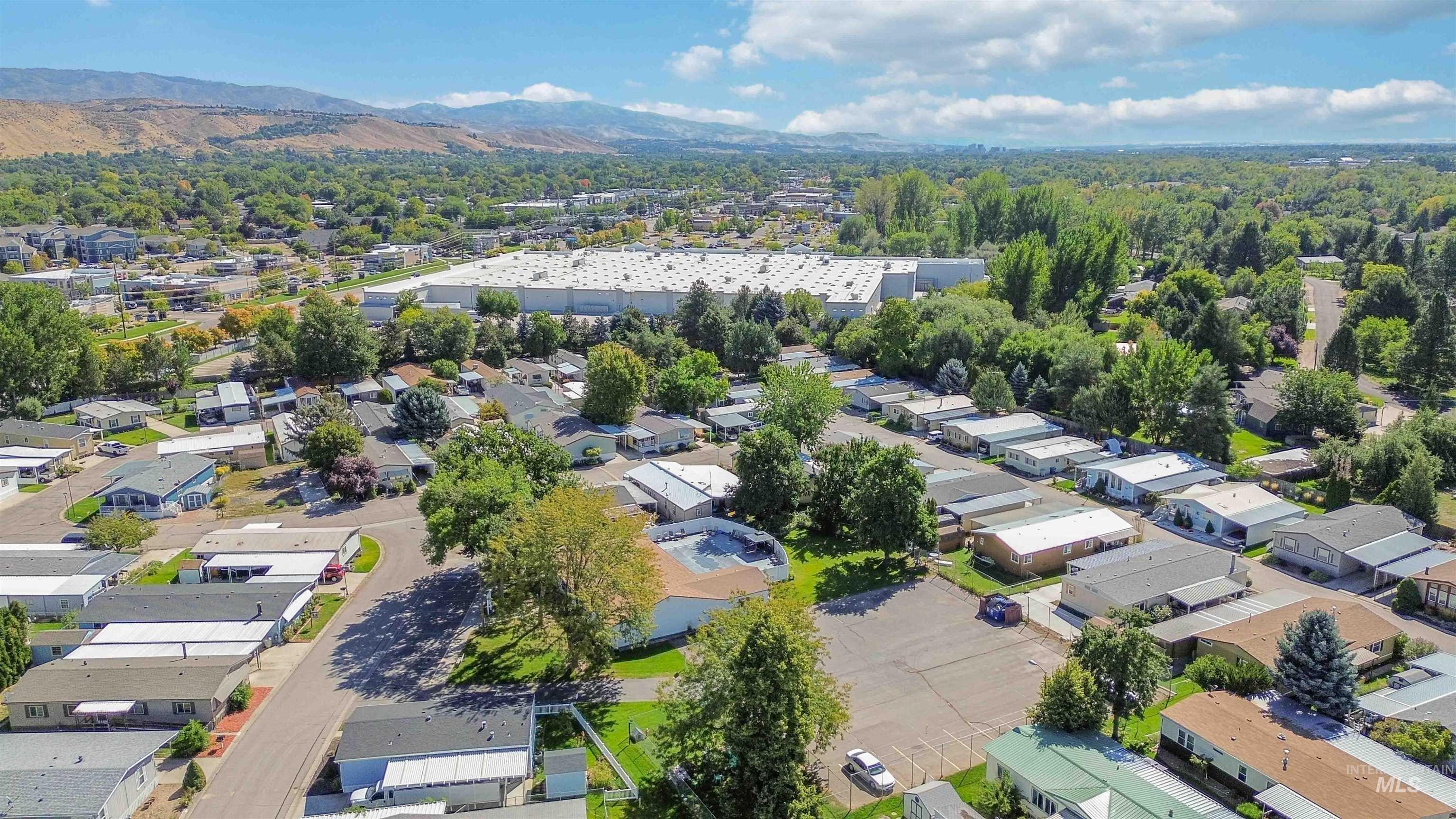 Aerial perspective of suburban area featuring mountains