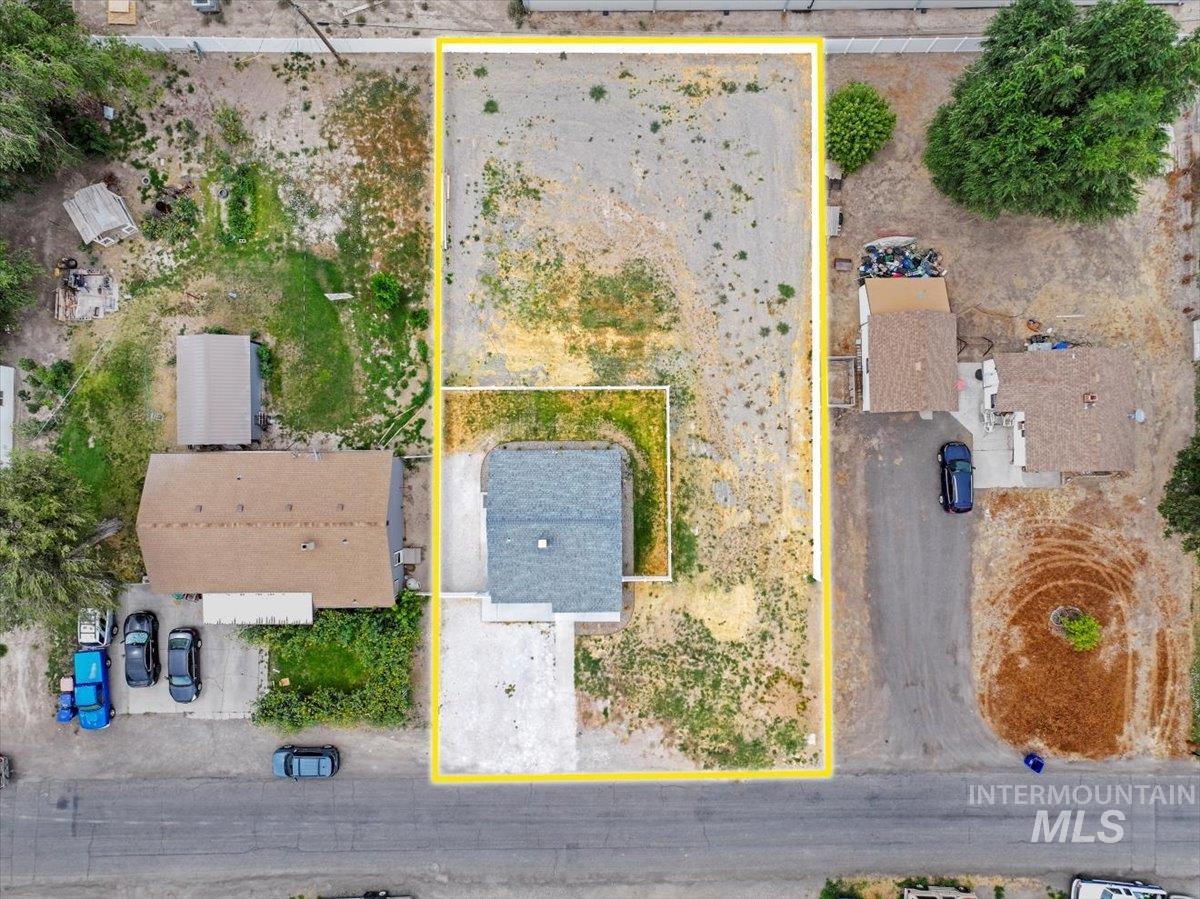 Aerial overview of property's location featuring property parcel outlined
