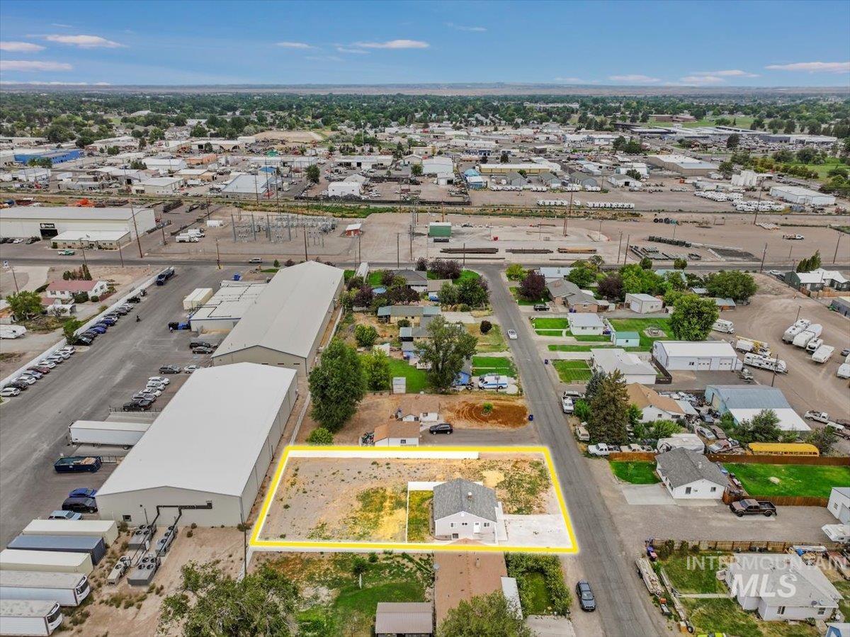 Aerial overview of property's location featuring property parcel outlined
