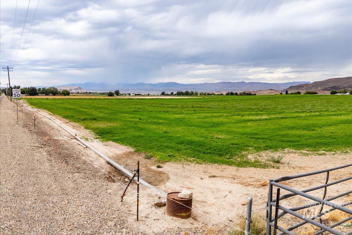 View of yard with a view of countryside and a mountain view