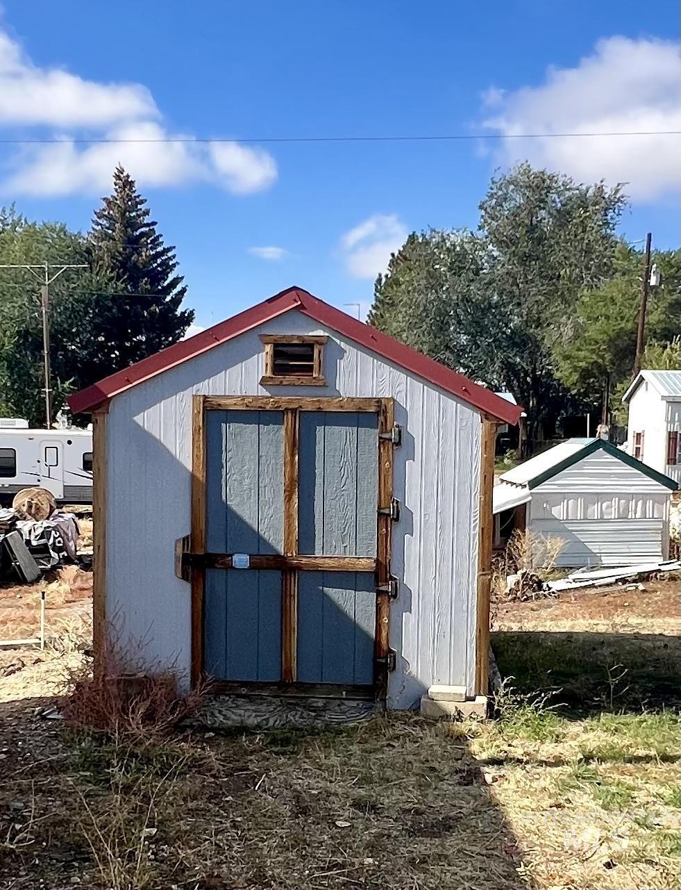 Front view of larger shed