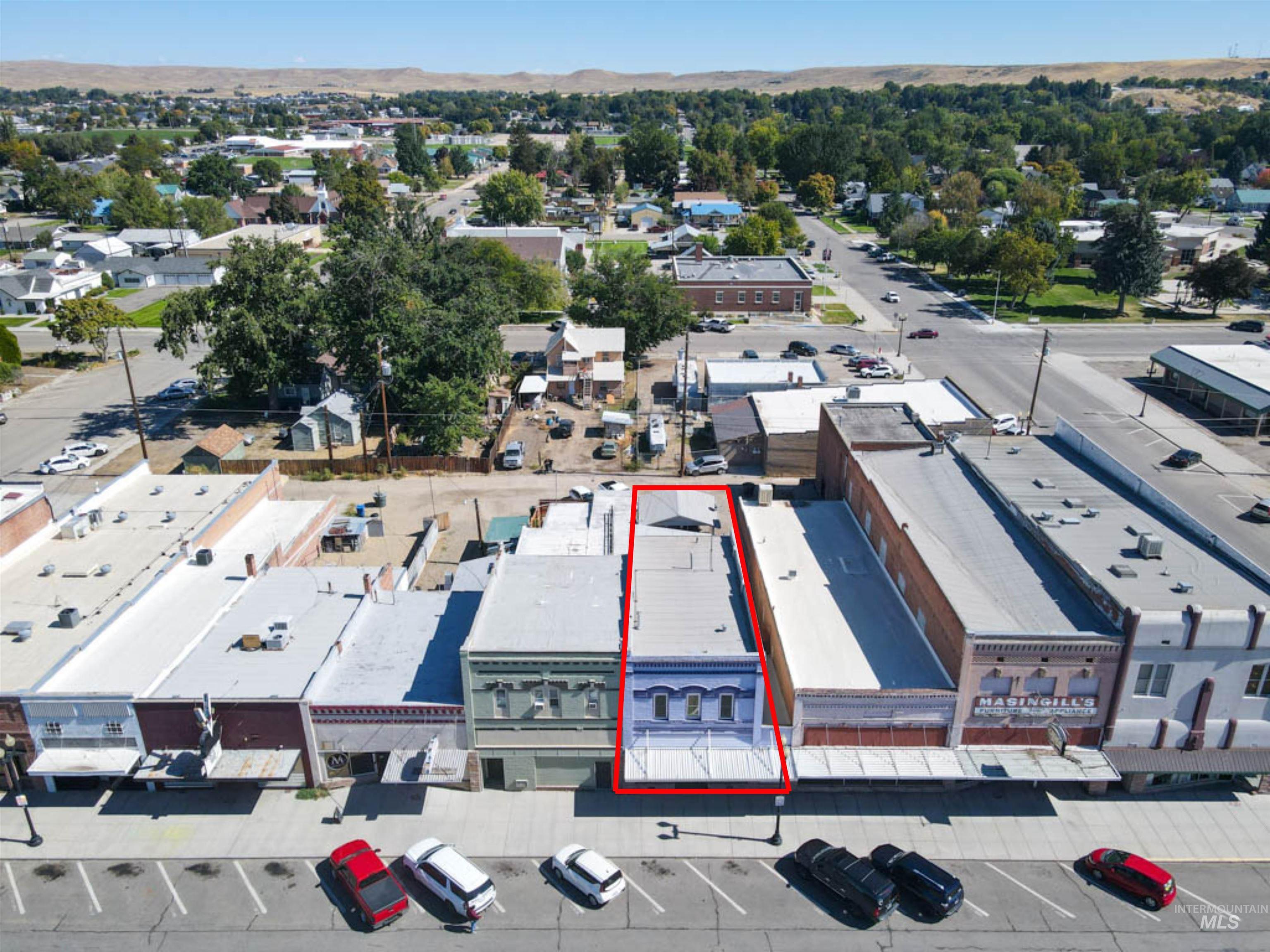 Aerial view of property's location featuring property parcel outlined