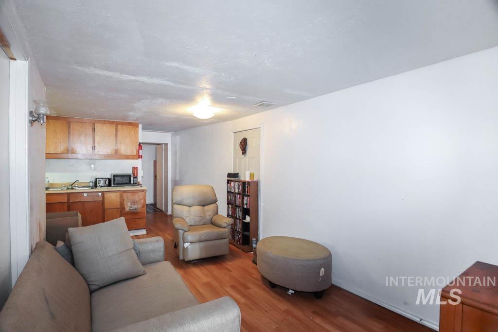 Living area featuring light wood finished floors