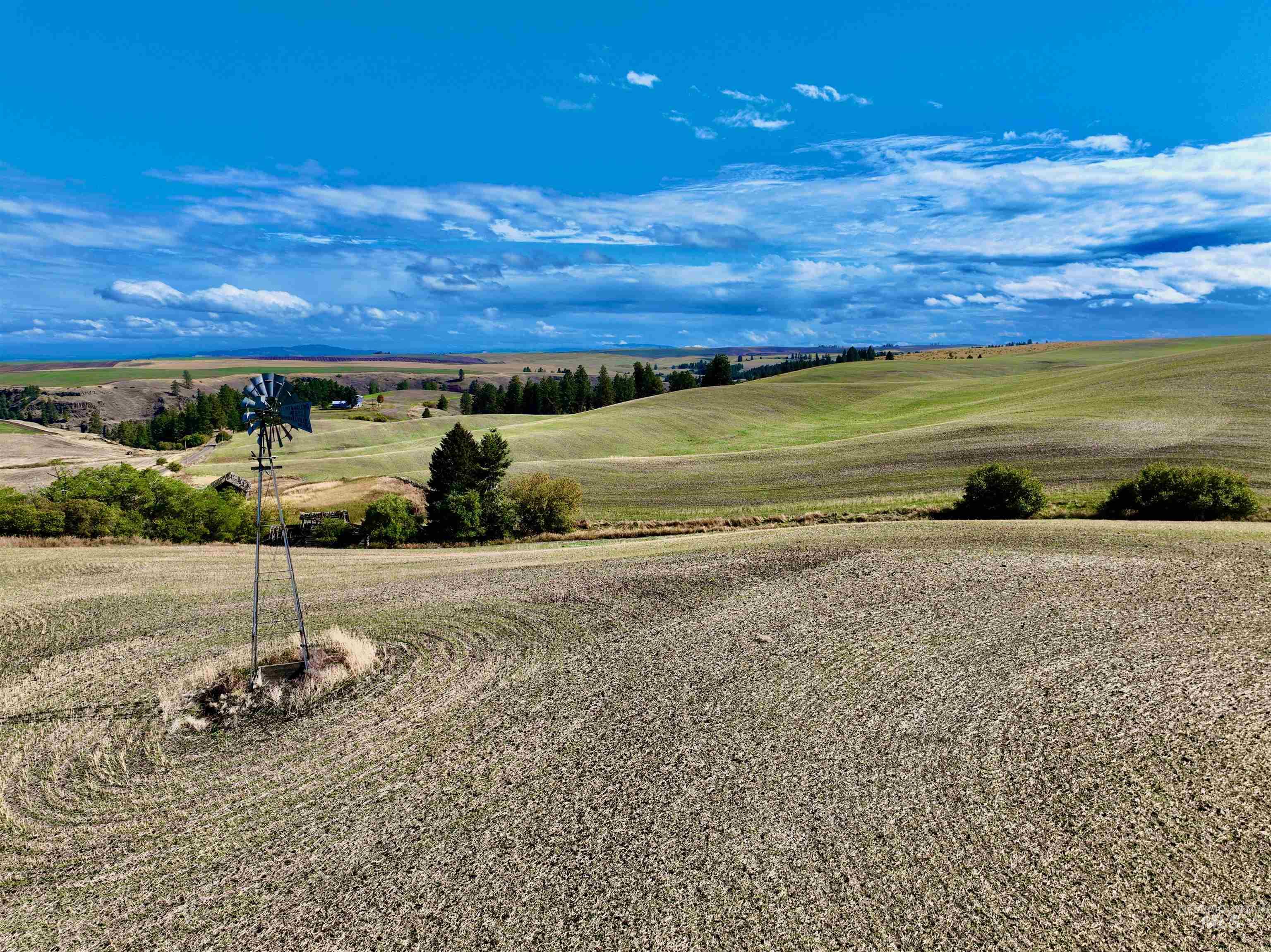 View of mountain background featuring rural landscape