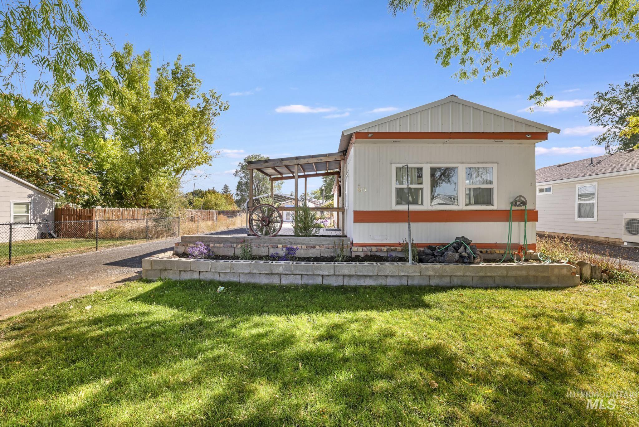 View of side of property featuring an ac unit