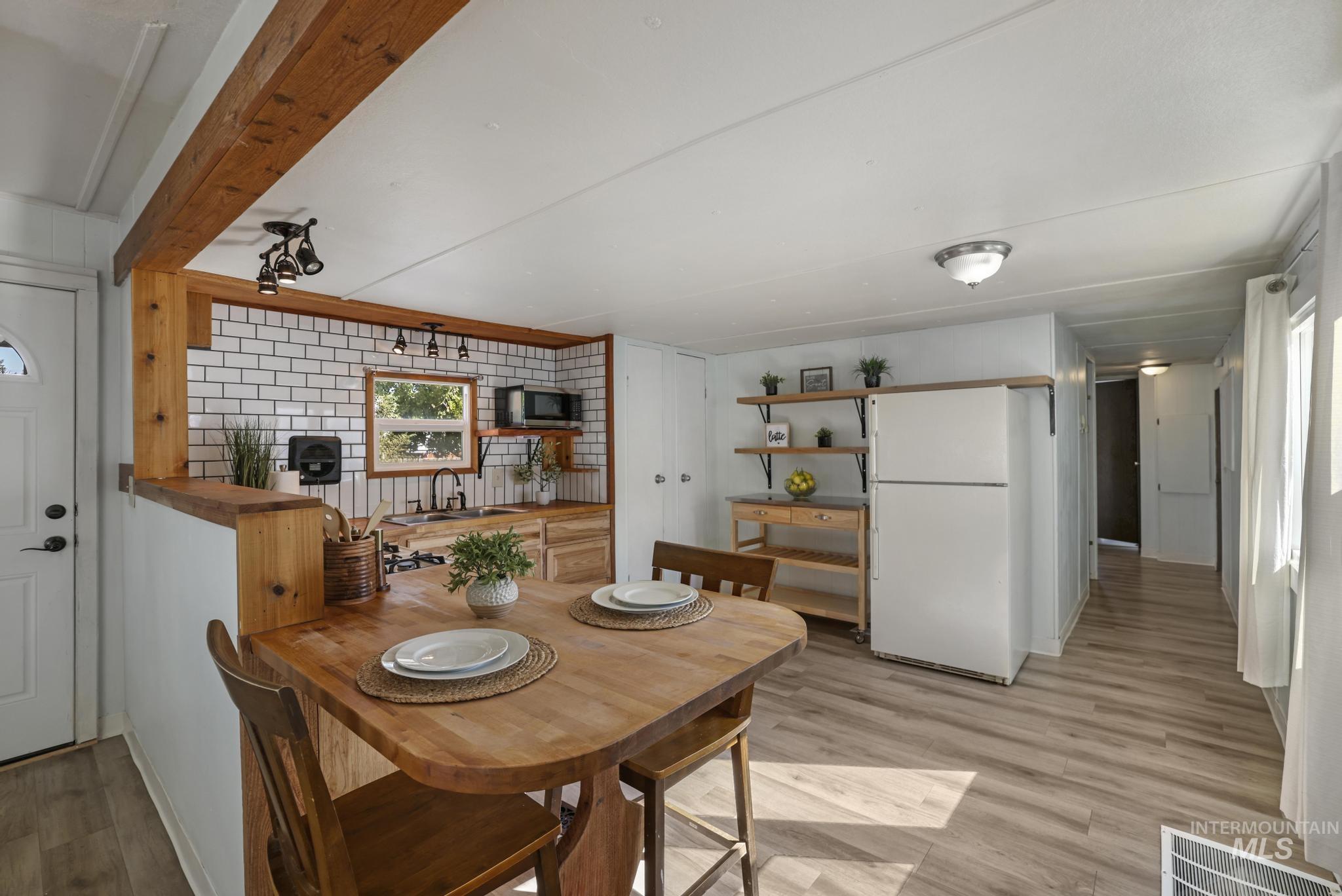 Dining room with light wood-type flooring