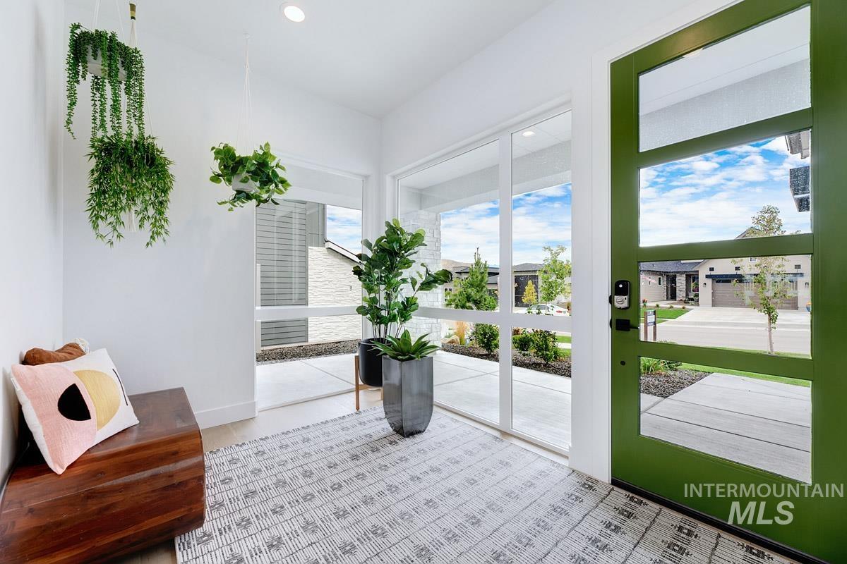 Sunroom / solarium with a residential view