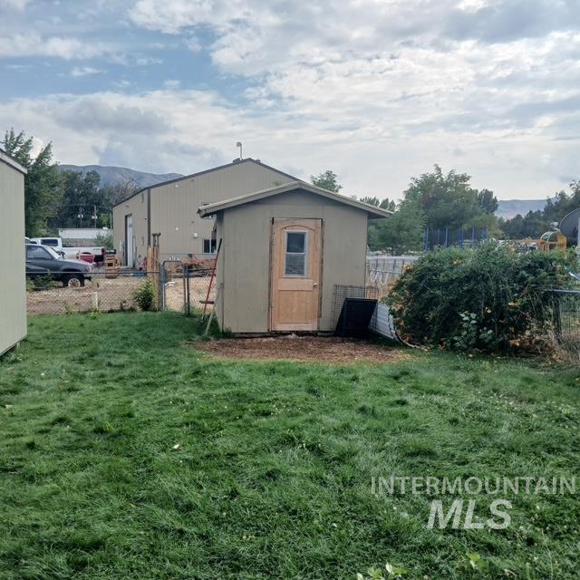 View of shed featuring a mountain view