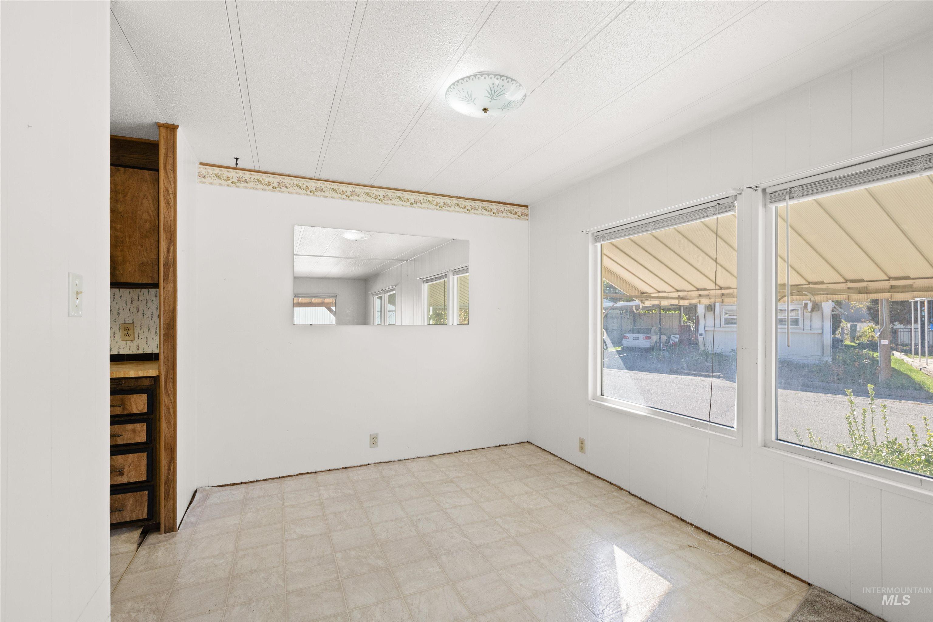 Dining room with light flooring