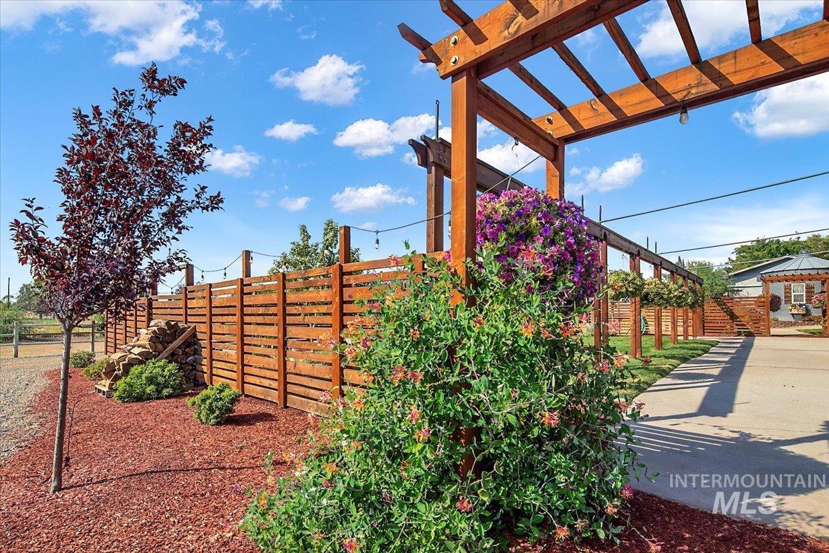 View of yard featuring a pergola