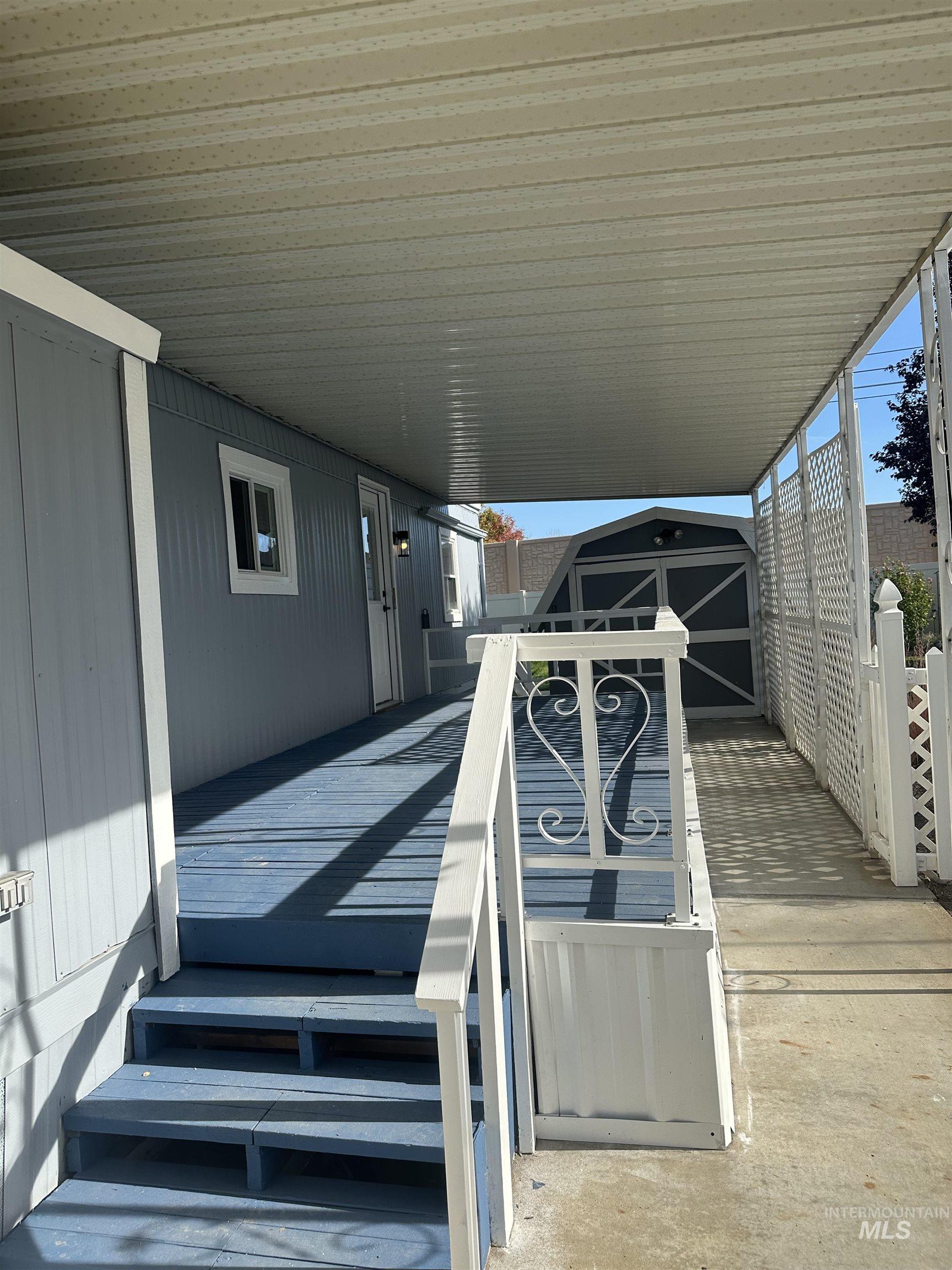 front deck  with a shed