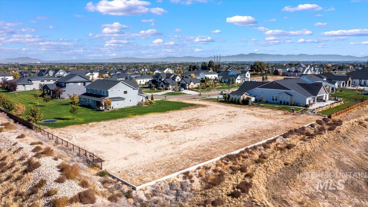 Aerial perspective of suburban area featuring mountains