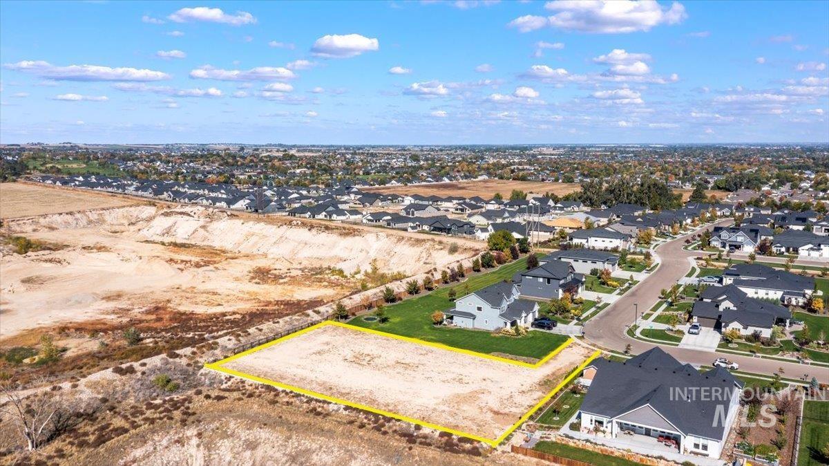 Aerial perspective of suburban area with property boundaries highlighted