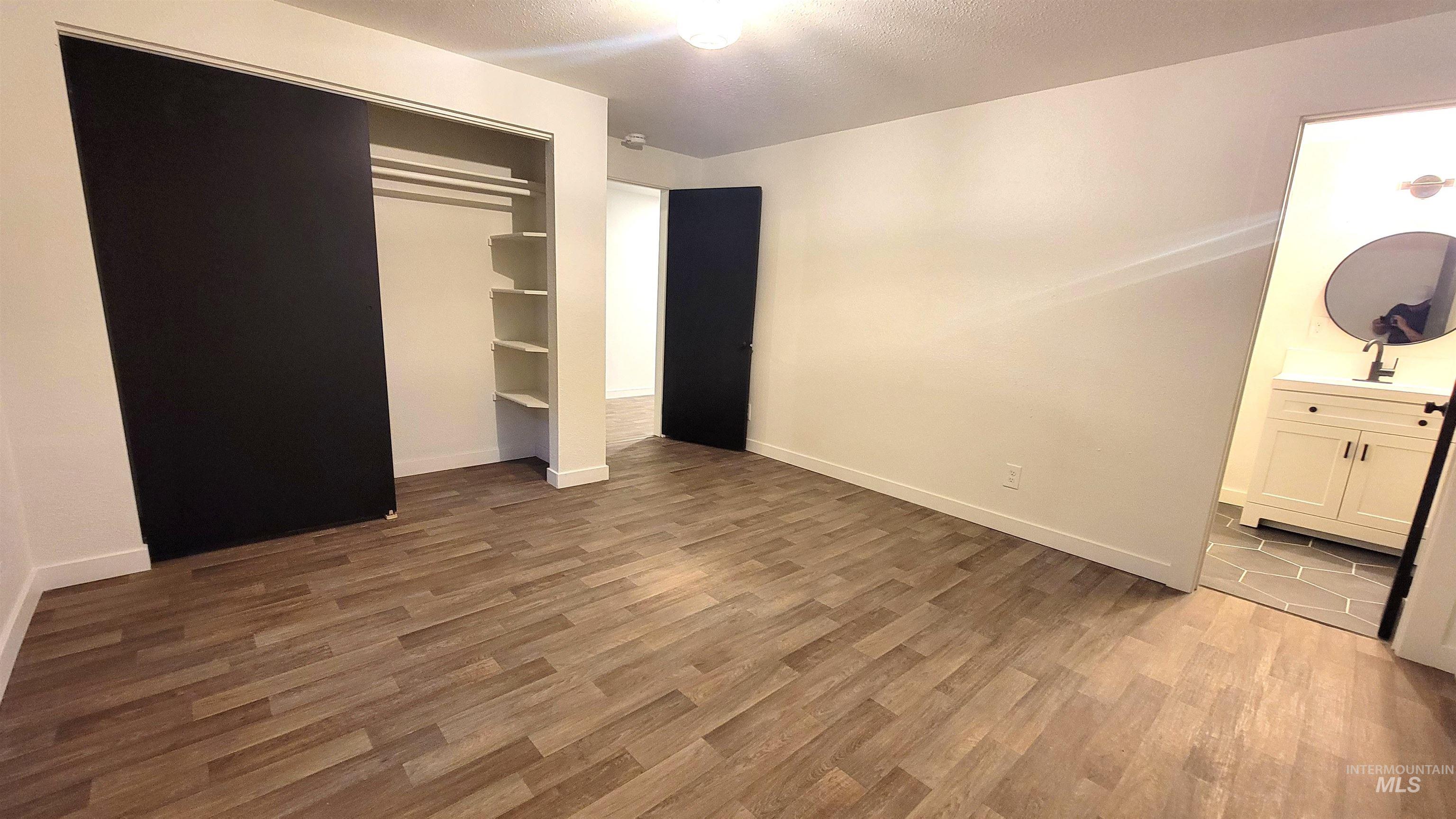 Unit B Primary with full bath