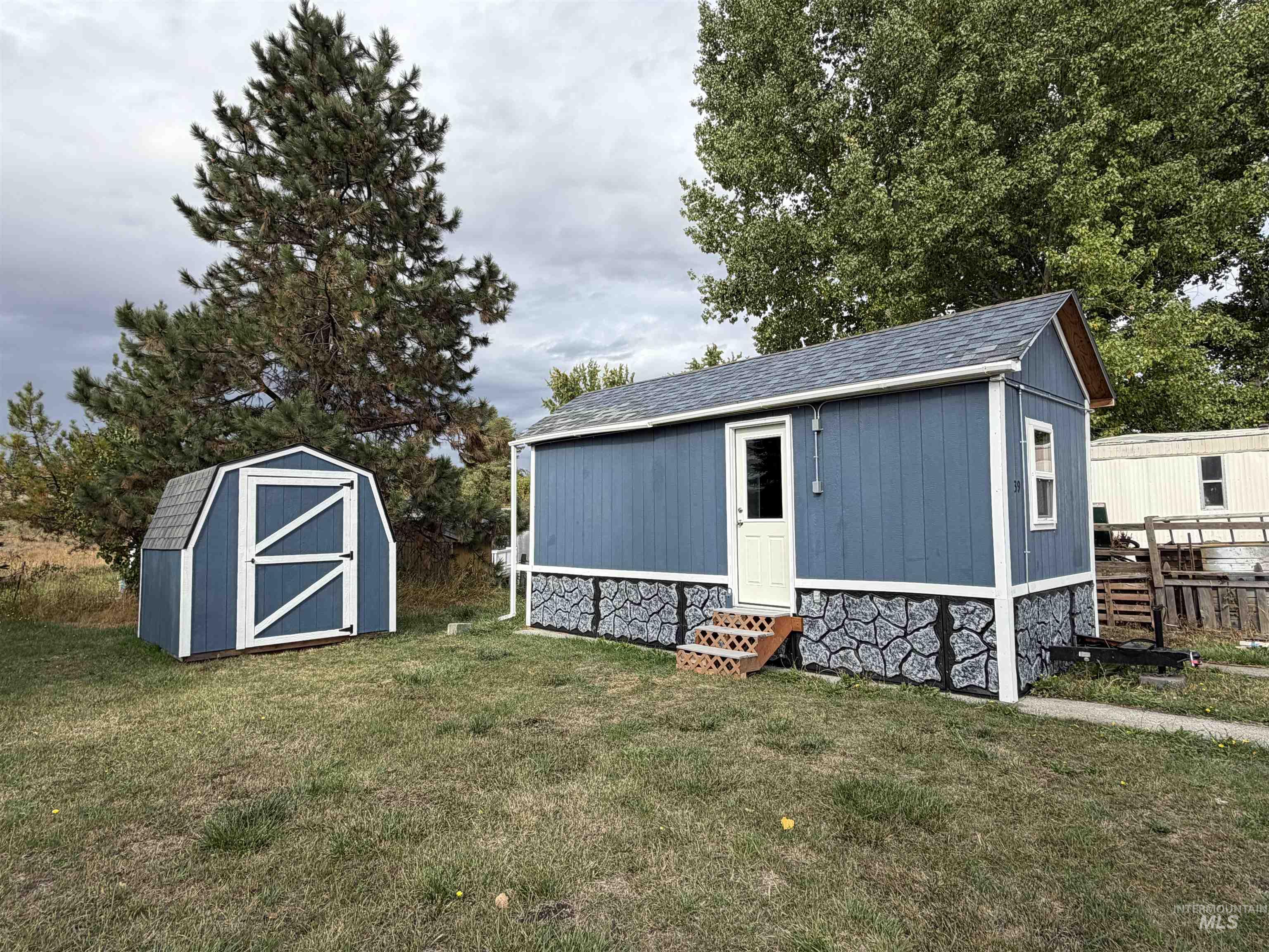 View of shed with entry steps