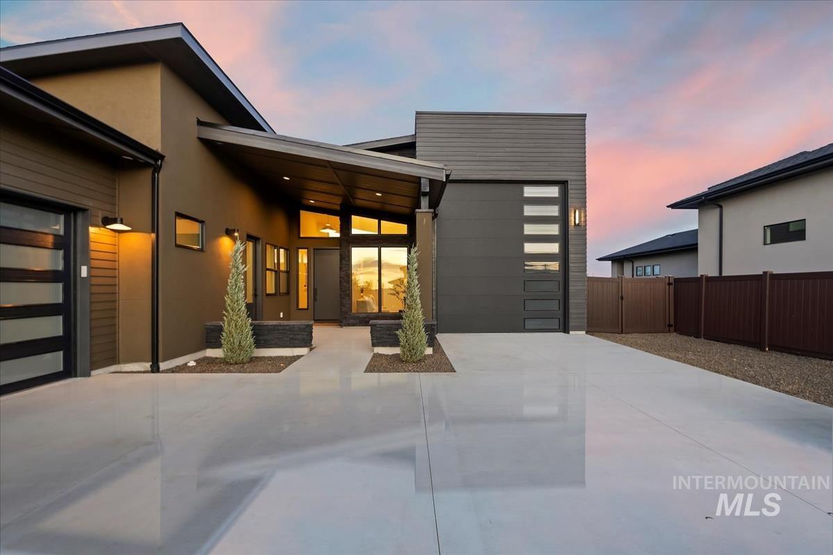 Front of the home with a covered courtyard