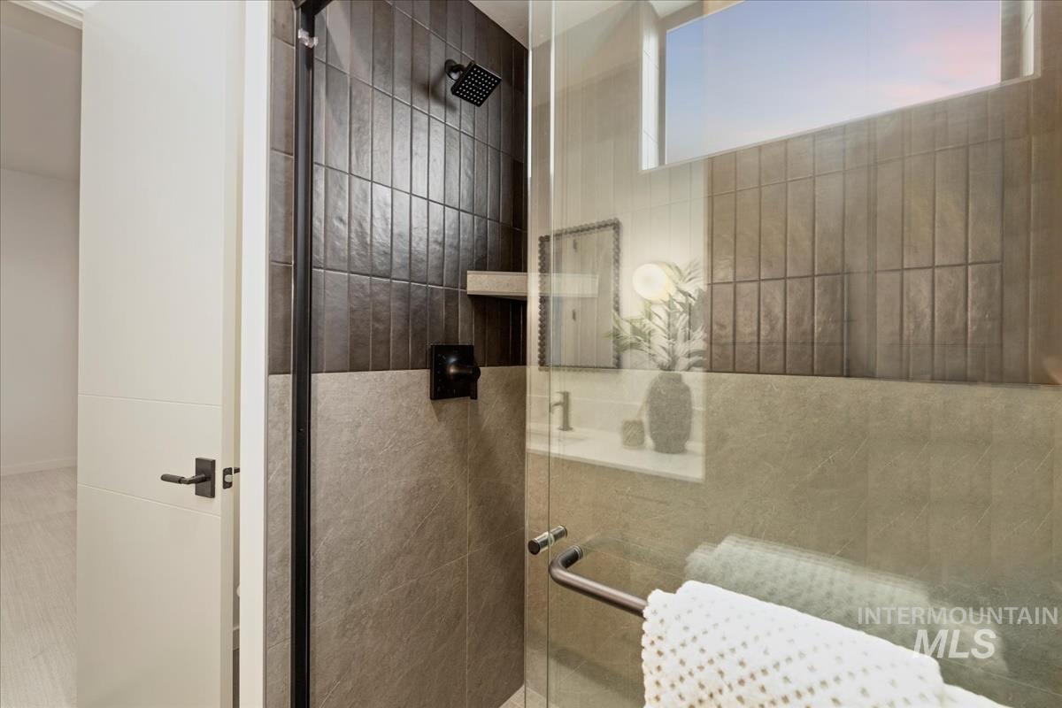 Bathroom with fully tiled shower