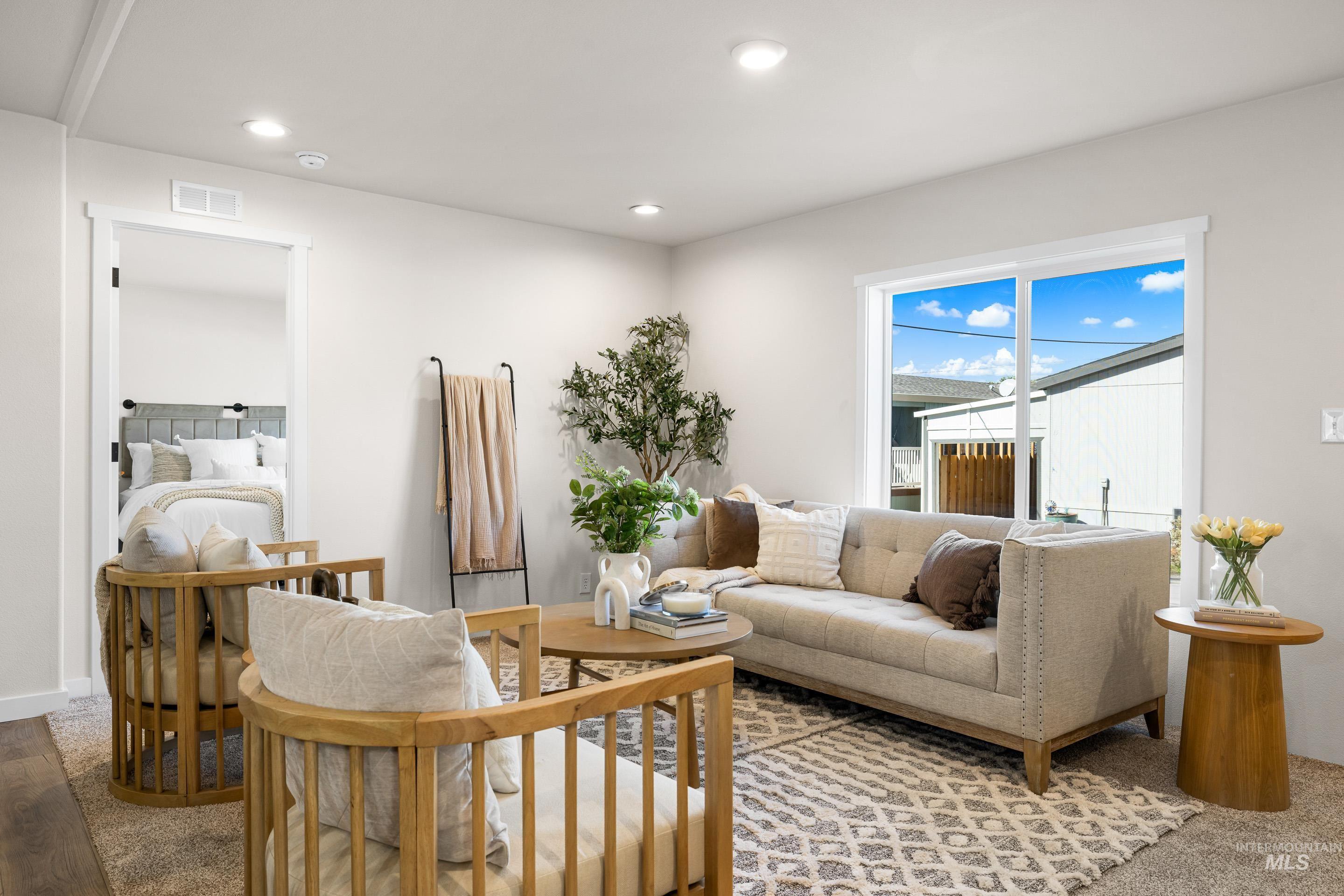 Living room featuring recessed lighting and wood finished floors
