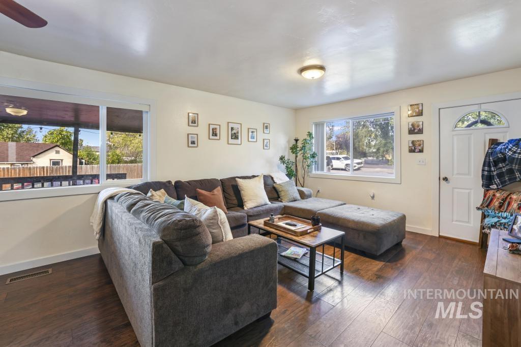 Living room with dark wood-style floors