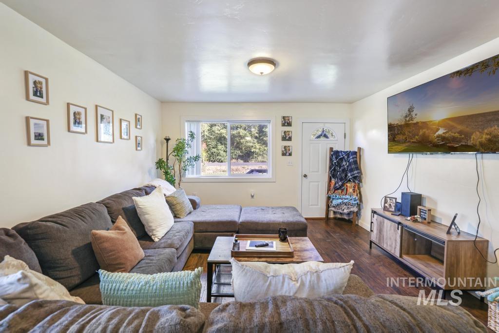 Living area with wood finished floors