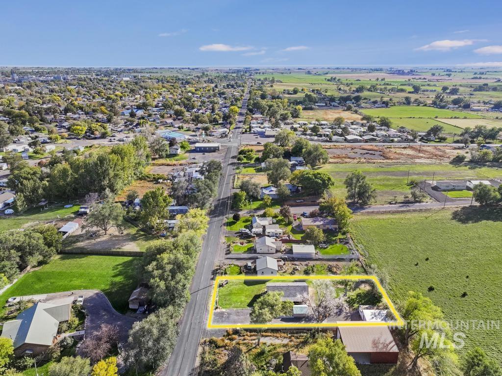Aerial perspective of suburban area with property boundaries highlighted