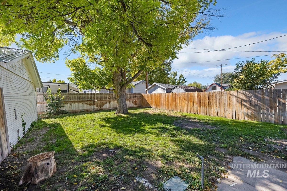 View of fenced backyard