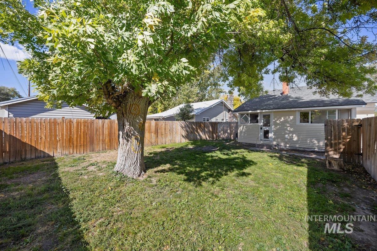 View of fenced backyard
