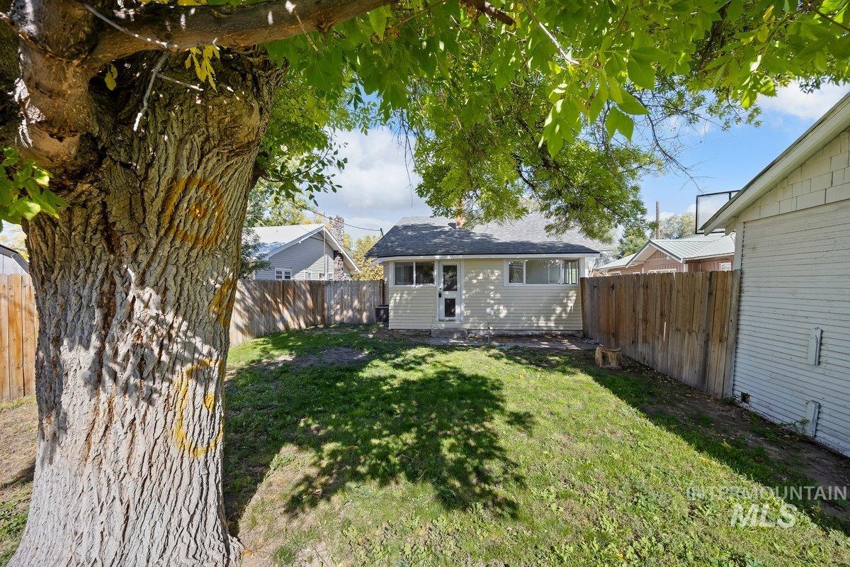 View of fenced backyard