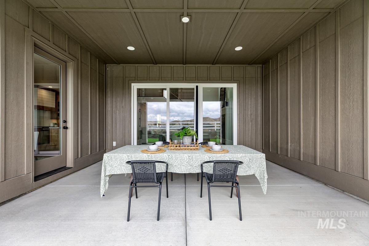 View of patio with outdoor dining area