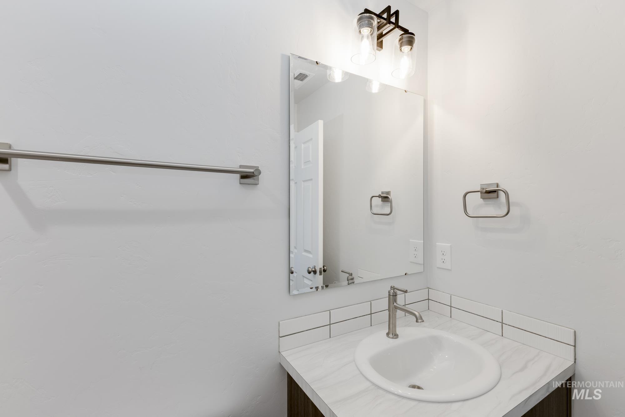 Bathroom featuring vanity