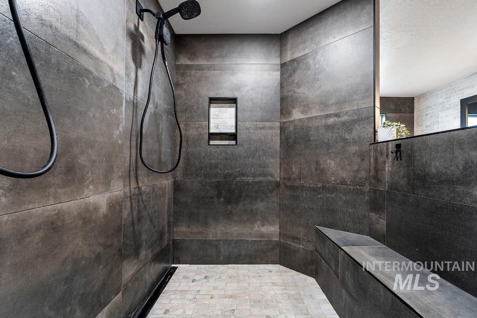 Bathroom with a tile shower