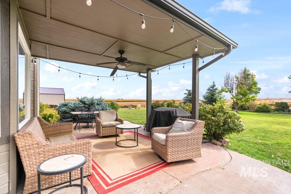 View of patio / terrace featuring a ceiling fan and outdoor lounge area