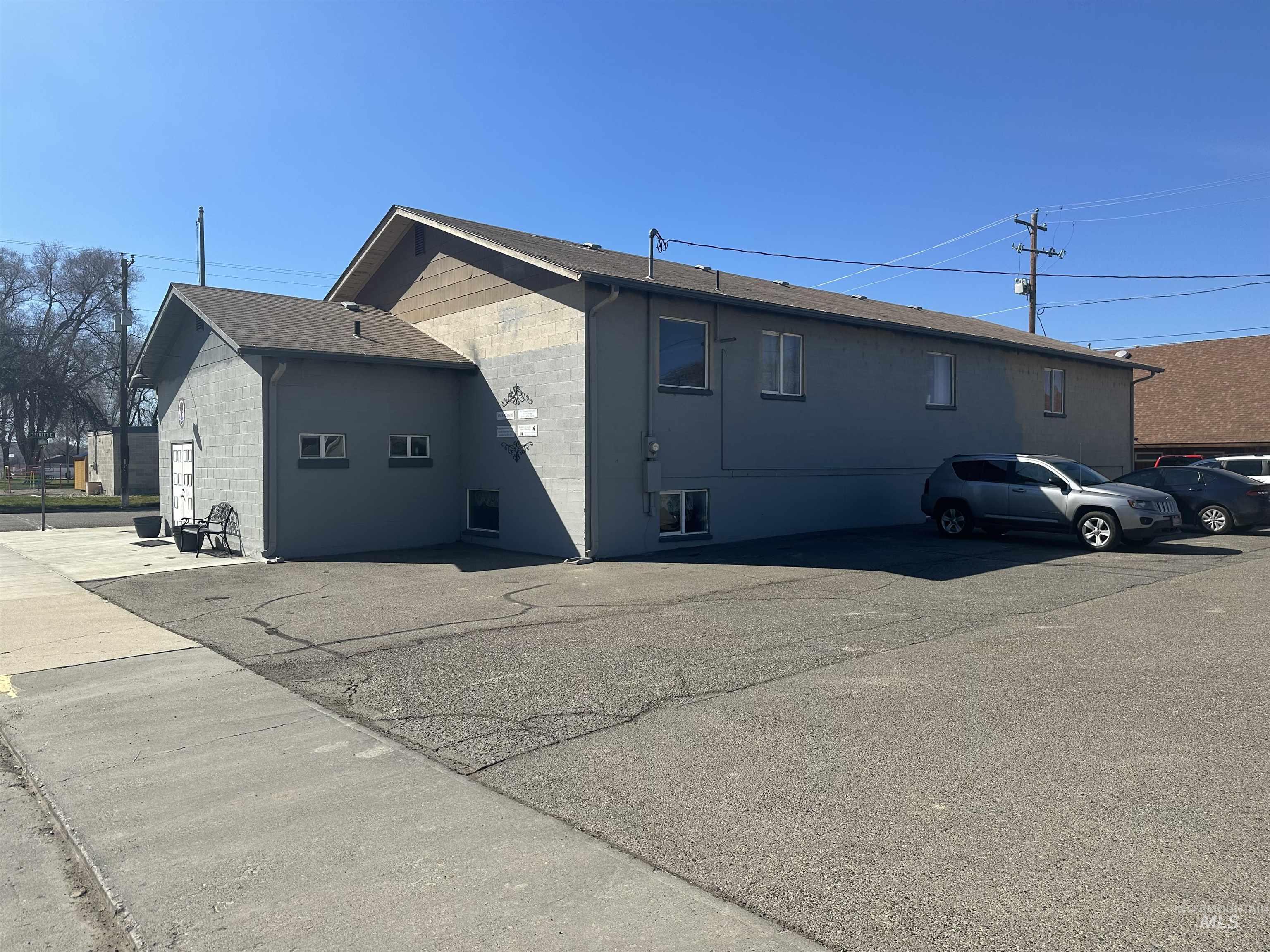 View of side of property with concrete block siding