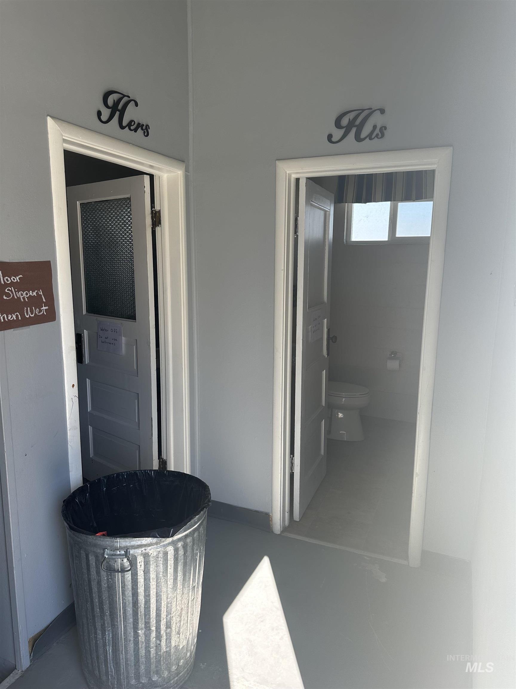 Bathroom featuring concrete flooring