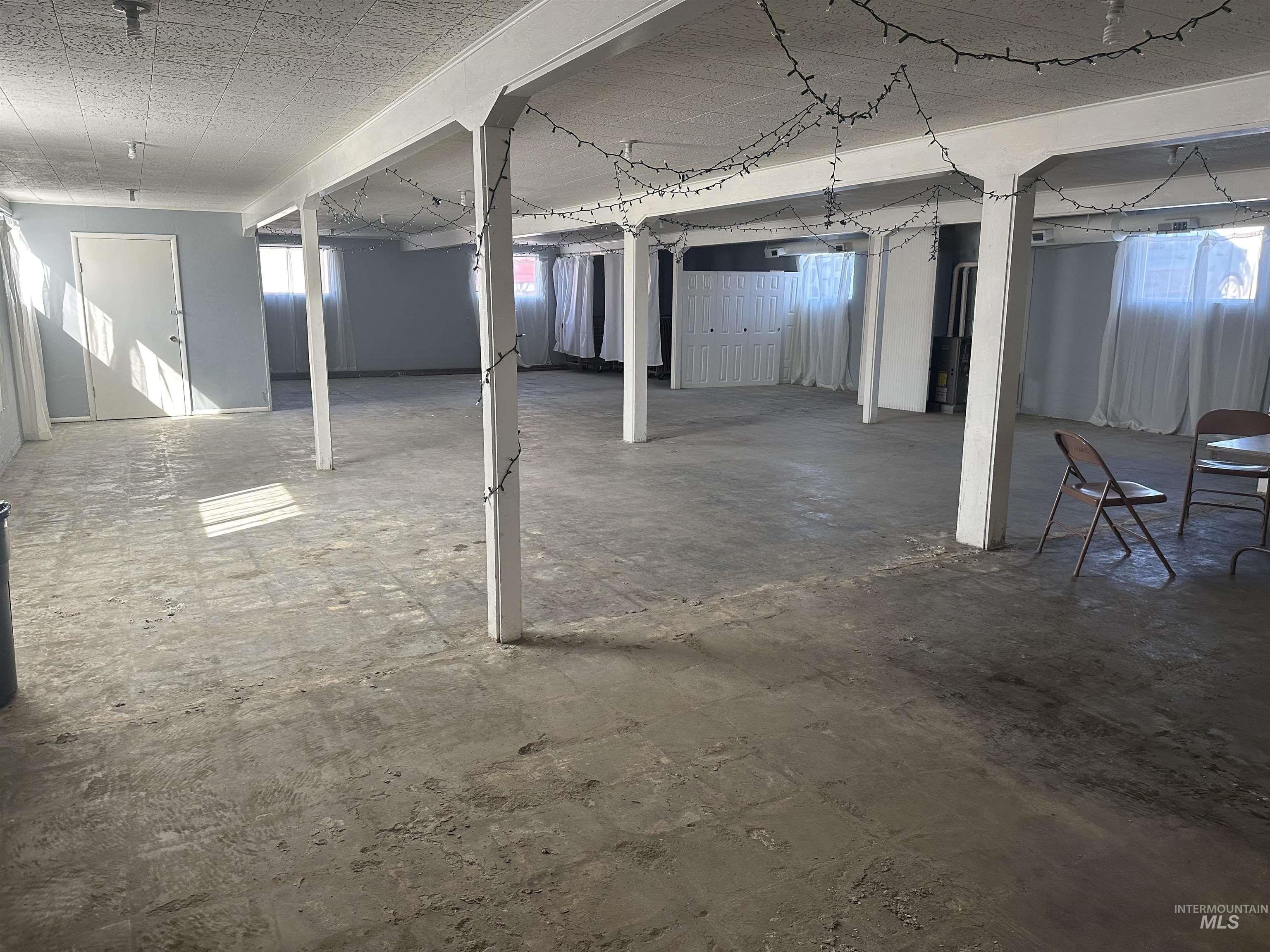 Basement featuring healthy amount of natural light