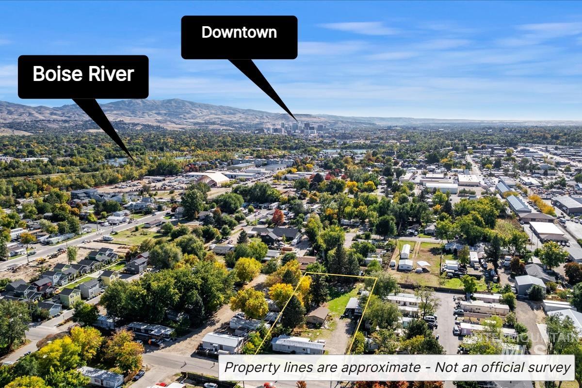 Aerial view of residential area with a mountainous background