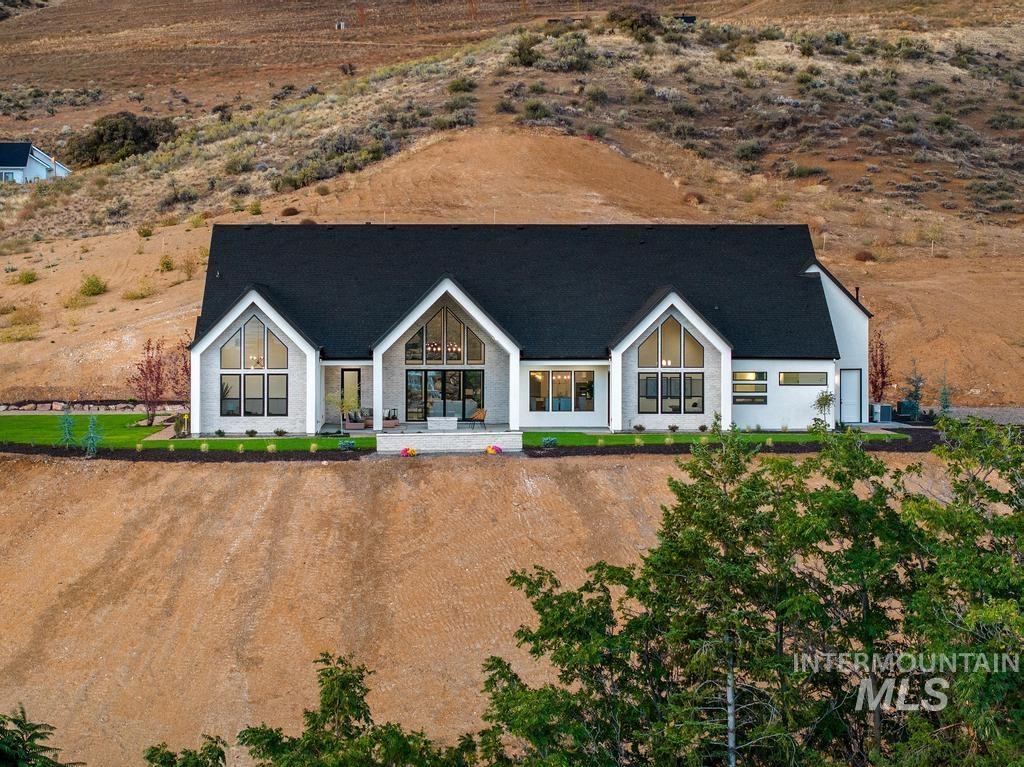 Modern farmhouse style home featuring covered porch