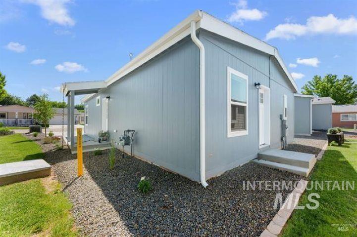View of home's exterior featuring a yard